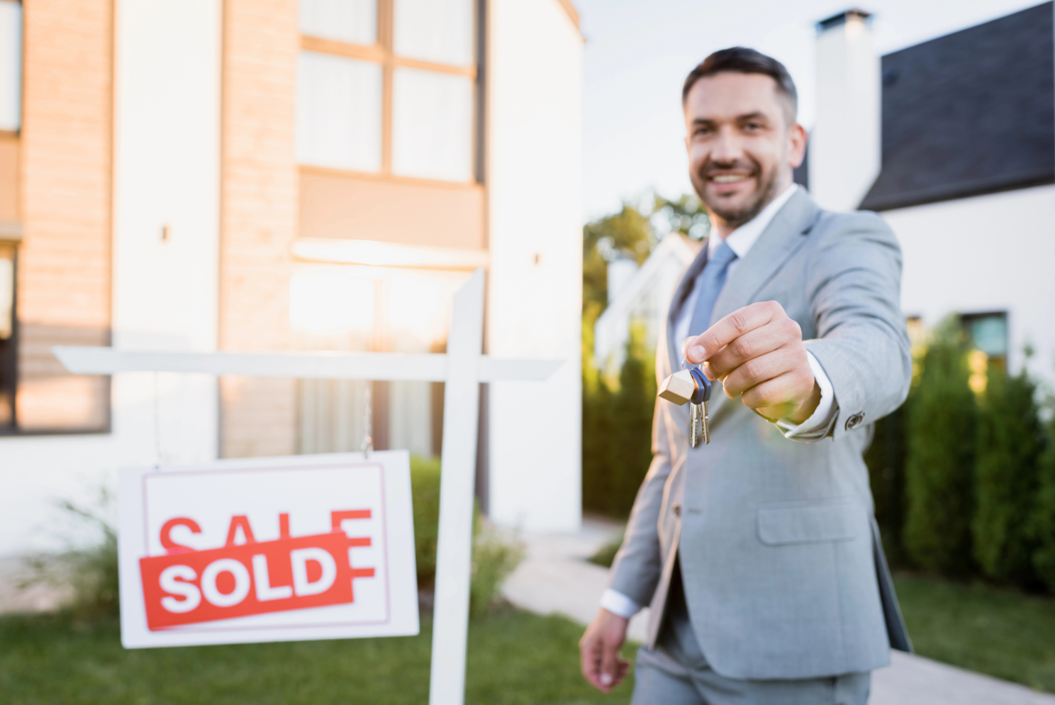Realtor Holding House Key